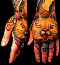 kotek tatuaż